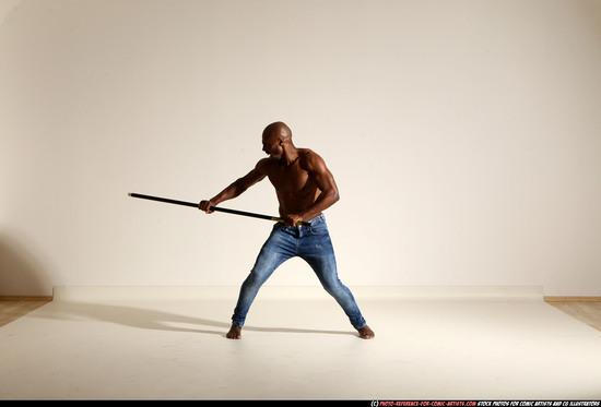 Man Adult Athletic Black Fighting with spear Moving poses Pants