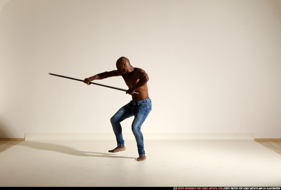 Man Adult Athletic Black Fighting with spear Moving poses Pants