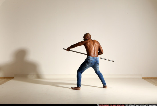 Man Adult Athletic Black Fighting with spear Moving poses Pants