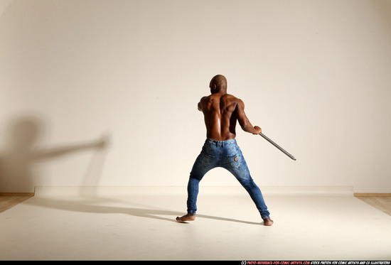 Man Adult Athletic Black Fighting with spear Moving poses Pants