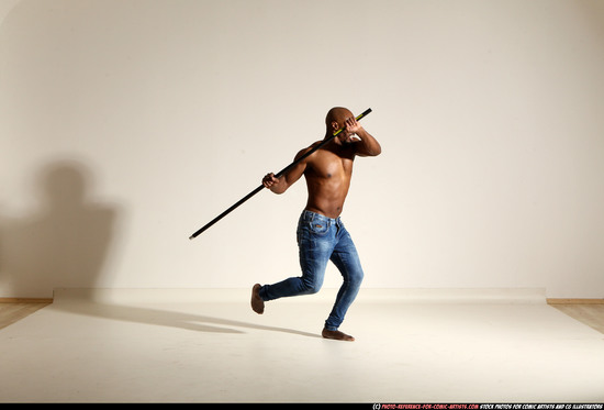 Man Adult Athletic Black Fighting with spear Moving poses Pants