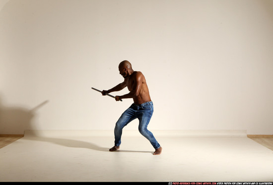 Man Adult Athletic Black Fighting with spear Moving poses Pants