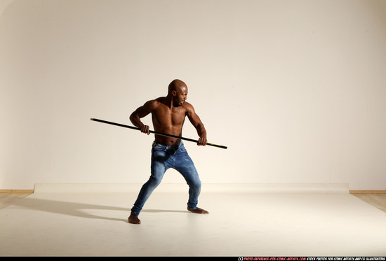 Man Adult Athletic Black Fighting with spear Moving poses Pants