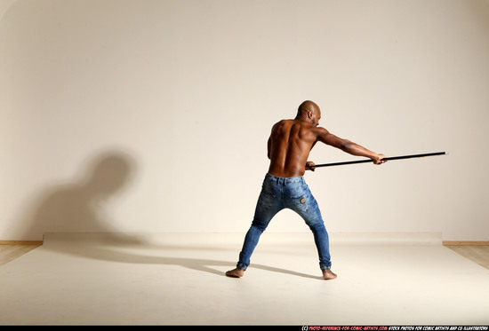 Man Adult Athletic Black Fighting with spear Moving poses Pants