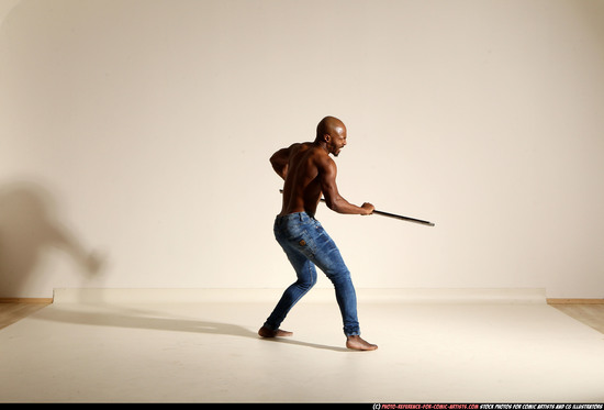 Man Adult Athletic Black Fighting with spear Moving poses Pants