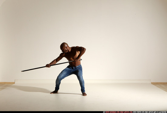 Man Adult Athletic Black Fighting with spear Moving poses Pants