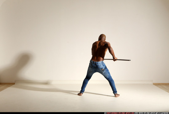 Man Adult Athletic Black Fighting with spear Moving poses Pants