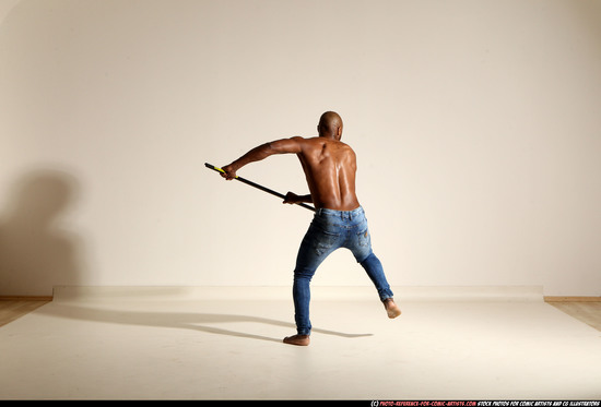 Man Adult Athletic Black Fighting with spear Moving poses Pants