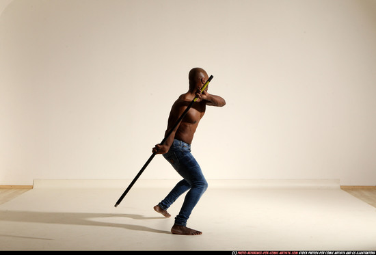 Man Adult Athletic Black Fighting with spear Moving poses Pants