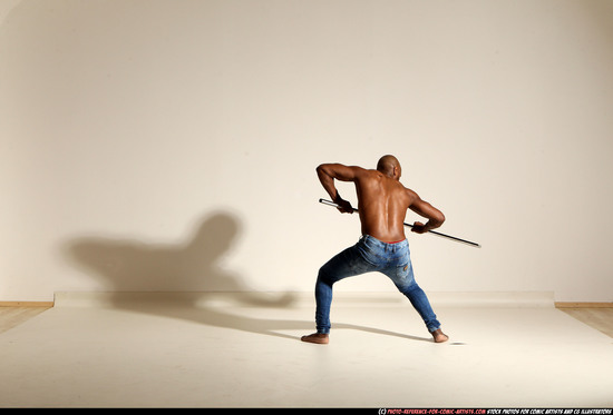 Man Adult Athletic Black Fighting with spear Moving poses Pants