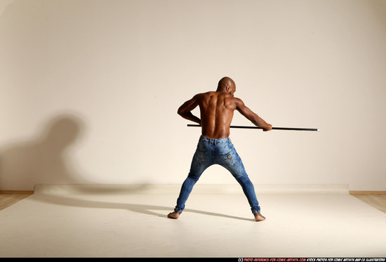 Man Adult Athletic Black Fighting with spear Moving poses Pants