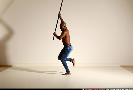 Man Adult Athletic Black Fighting with spear Moving poses Pants