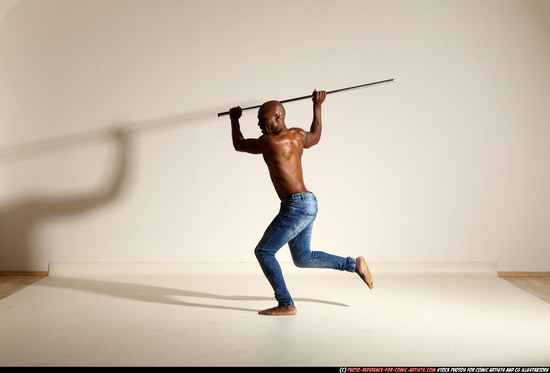 Man Adult Athletic Black Fighting with spear Moving poses Pants