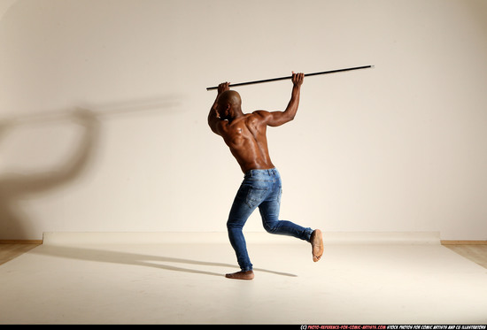 Man Adult Athletic Black Fighting with spear Moving poses Pants