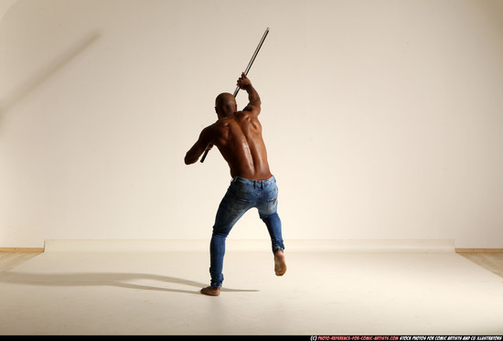 Man Adult Athletic Black Fighting with spear Moving poses Pants