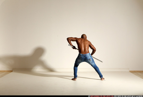 Man Adult Athletic Black Fighting with spear Moving poses Pants