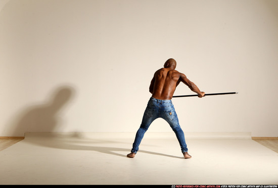 Man Adult Athletic Black Fighting with spear Moving poses Pants