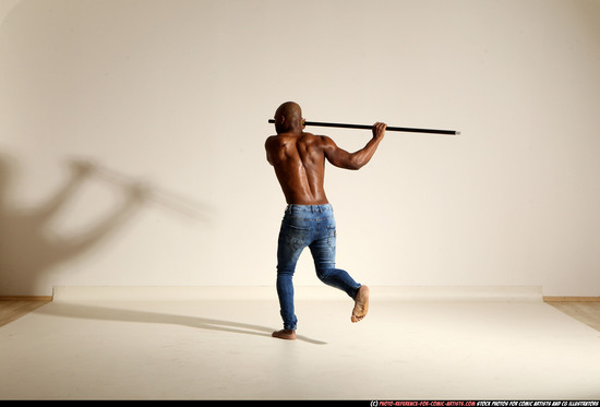 Man Adult Athletic Black Fighting with spear Moving poses Pants