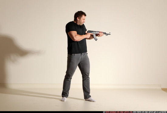 Man Adult Muscular White Fighting with submachine gun Moving poses Casual