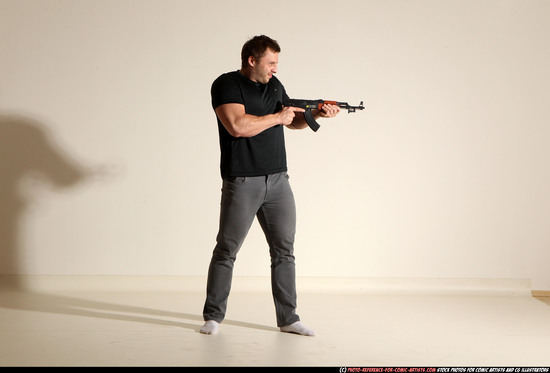 Man Adult Muscular White Fighting with submachine gun Moving poses Casual