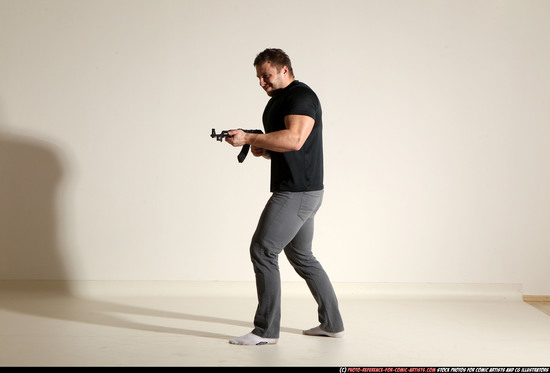 Man Adult Muscular White Fighting with submachine gun Moving poses Casual