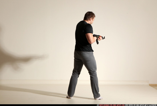 Man Adult Muscular White Fighting with submachine gun Moving poses Casual