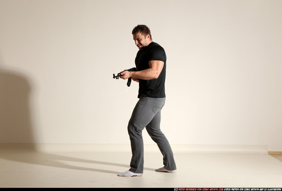 Man Adult Muscular White Fighting with submachine gun Moving poses Casual