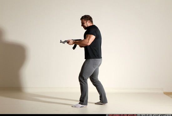 Man Adult Muscular White Fighting with submachine gun Moving poses Casual