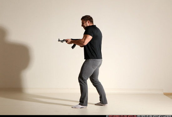 Man Adult Muscular White Fighting with submachine gun Moving poses Casual