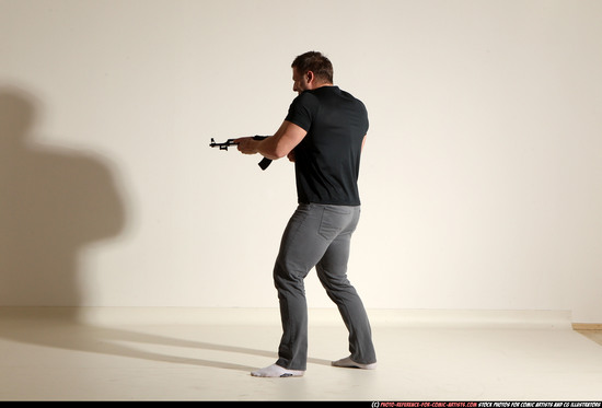 Man Adult Muscular White Fighting with submachine gun Moving poses Casual