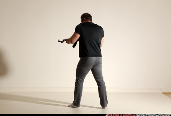 Man Adult Muscular White Fighting with submachine gun Moving poses Casual