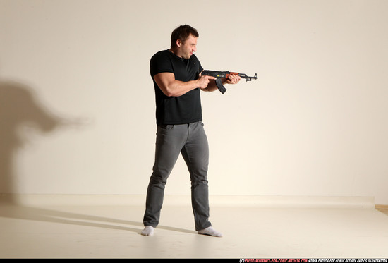 Man Adult Muscular White Fighting with submachine gun Moving poses Casual