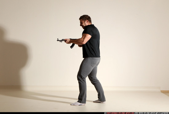 Man Adult Muscular White Fighting with submachine gun Moving poses Casual