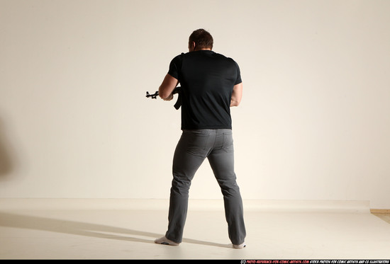 Man Adult Muscular White Fighting with submachine gun Moving poses Casual