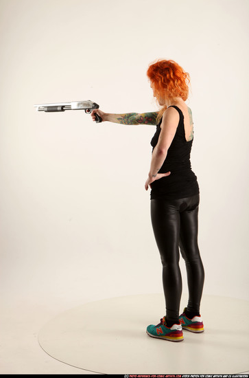 Woman Adult Athletic White Casual Fighting with shotgun