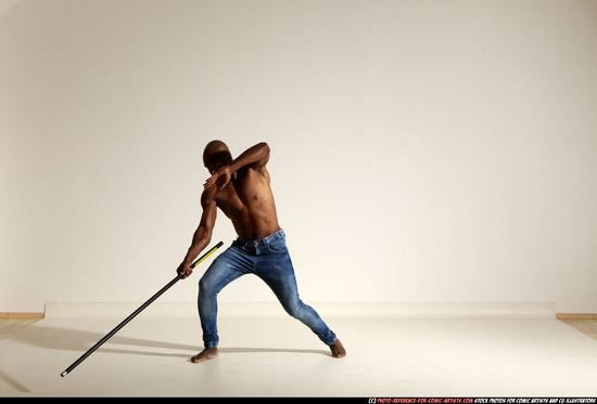 Man Adult Athletic Black Fighting with spear Moving poses Pants