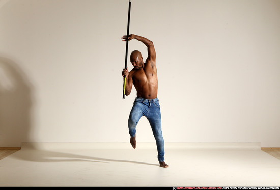 Man Adult Athletic Black Fighting with spear Moving poses Pants