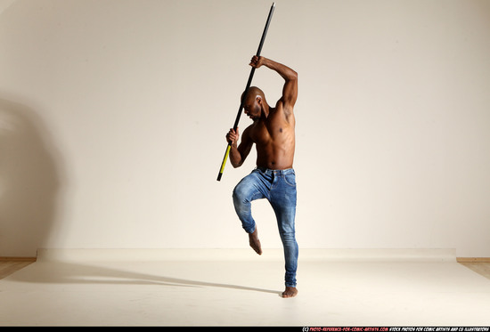 Man Adult Athletic Black Fighting with spear Moving poses Pants