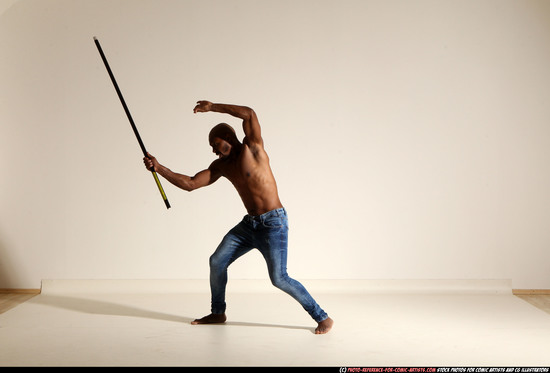 Man Adult Athletic Black Fighting with spear Moving poses Pants