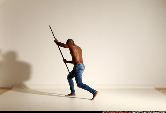 Man Adult Athletic Black Fighting with spear Moving poses Pants