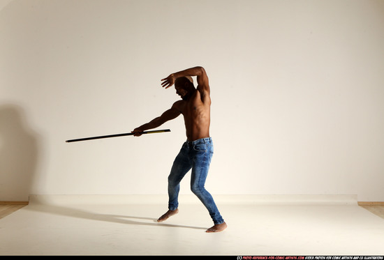 Man Adult Athletic Black Fighting with spear Moving poses Pants