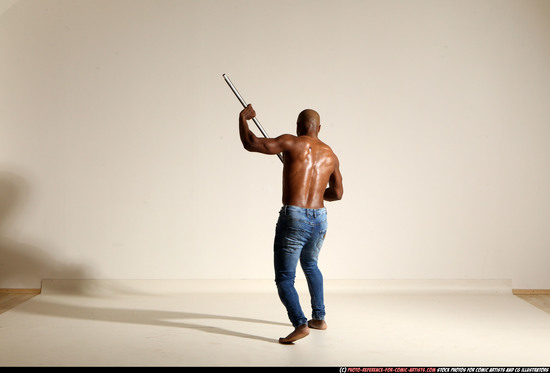 Man Adult Athletic Black Fighting with spear Moving poses Pants