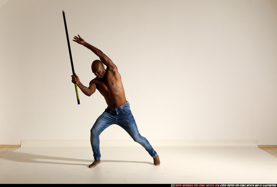 Man Adult Athletic Black Fighting with spear Moving poses Pants