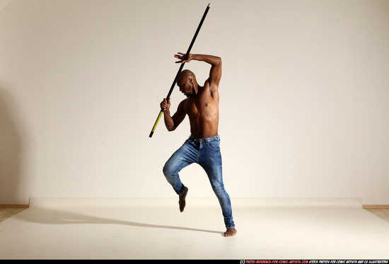 Man Adult Athletic Black Fighting with spear Moving poses Pants