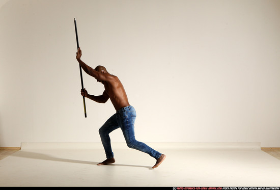 Man Adult Athletic Black Fighting with spear Moving poses Pants