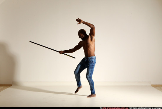 Man Adult Athletic Black Fighting with spear Moving poses Pants