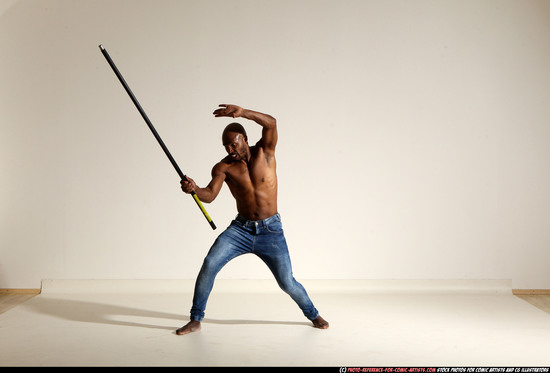 Man Adult Athletic Black Fighting with spear Moving poses Pants