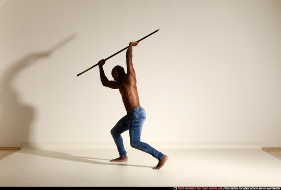 Man Adult Athletic Black Fighting with spear Moving poses Pants