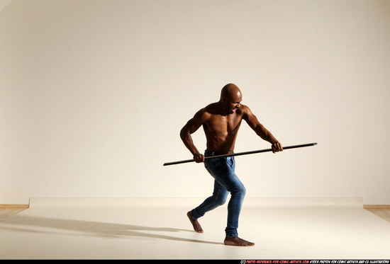 Man Adult Athletic Black Fighting with spear Moving poses Pants