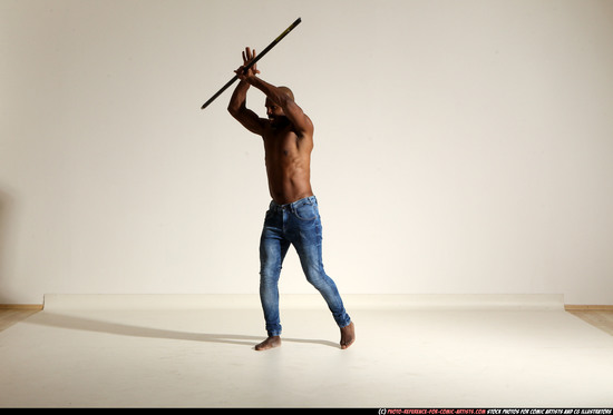 Man Adult Athletic Black Fighting with spear Moving poses Pants